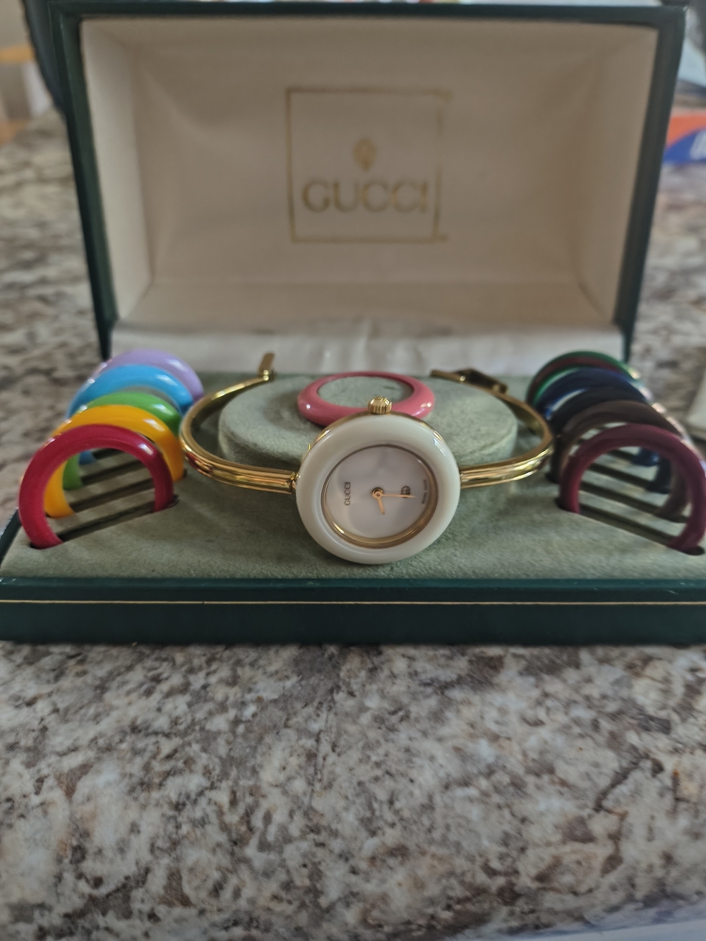 NON WORKING Gucci Women’s Gold Bangle Watch with Interchangeable Colored Bezels